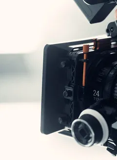 Film camera and clapperboard on set, representing Screen Australia's screen and games industry valuation